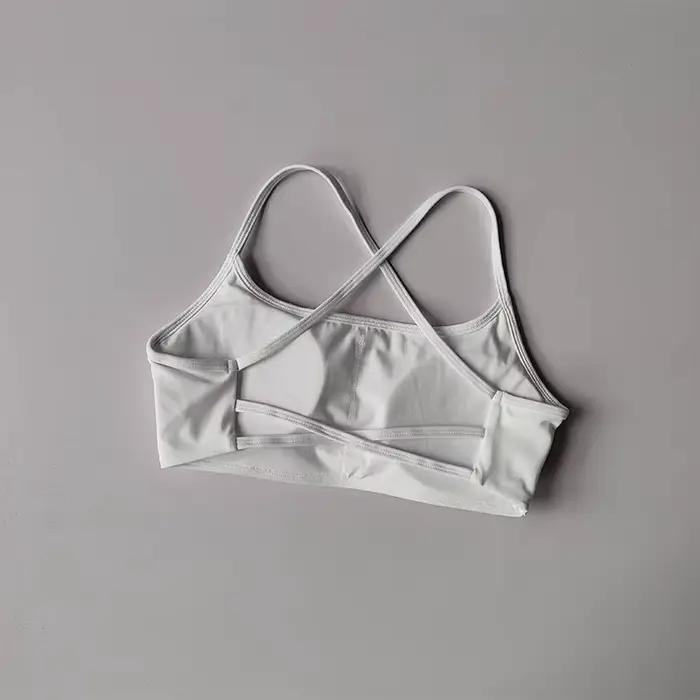 Soutien-gorge de yoga effet seconde peau à dos croisé : Haut d'entraînement rembourré à bretelles, s