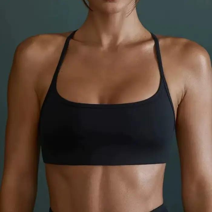 Soutien-gorge de yoga effet seconde peau à dos croisé : Haut d'entraînement rembourré à bretelles, soutien-gorge de sport respirant à séchage rapide et anti-humidité pour le Pilates