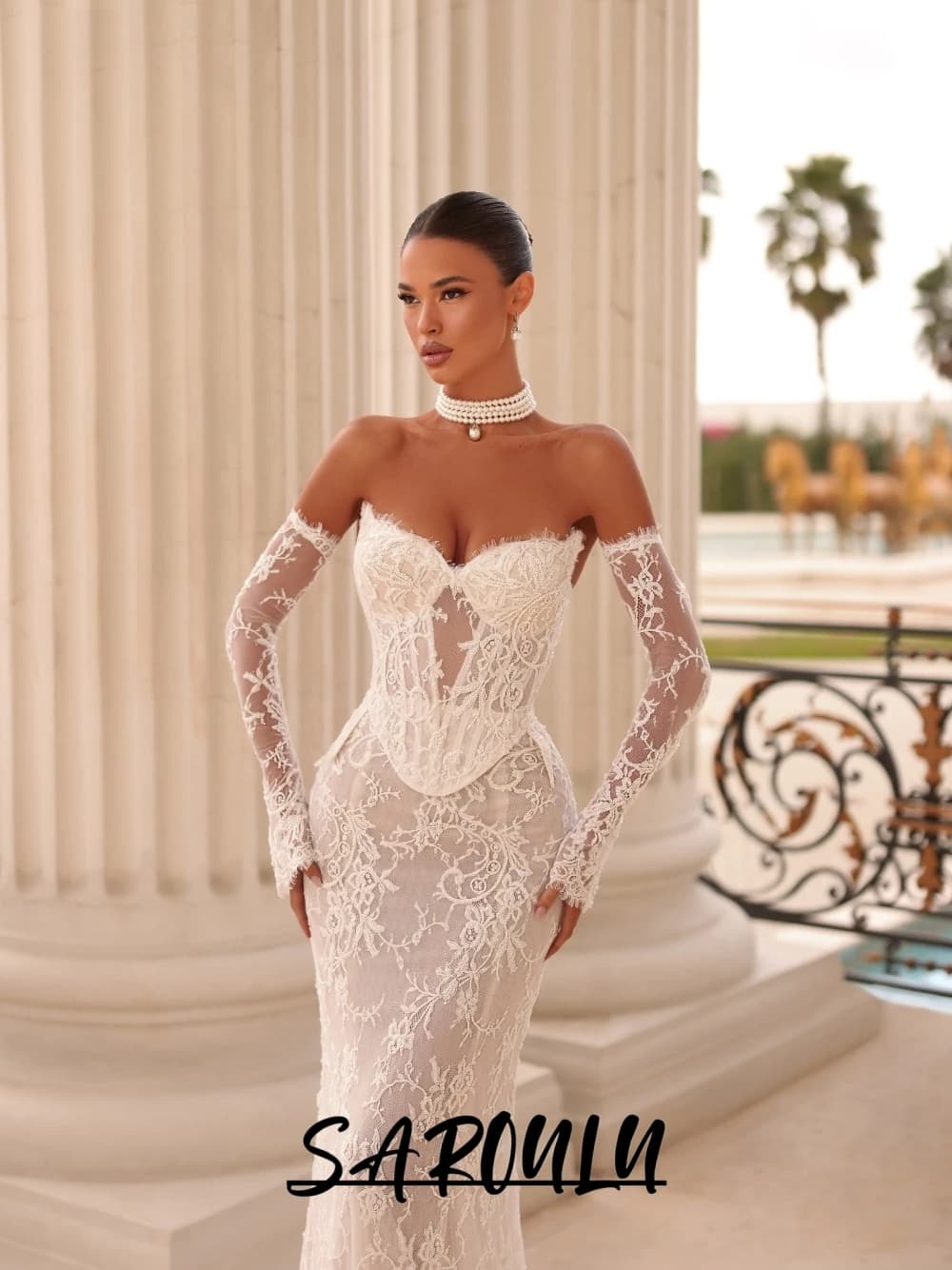 Robe de mariée sirène ajustée style corset, élégante et personnalisable, avec manches longues en den