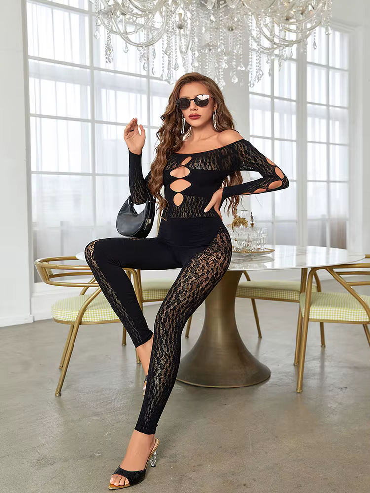 Combinaison transparente super élastique en maille ajourée pour soirée en boîte de nuit, mettant en 