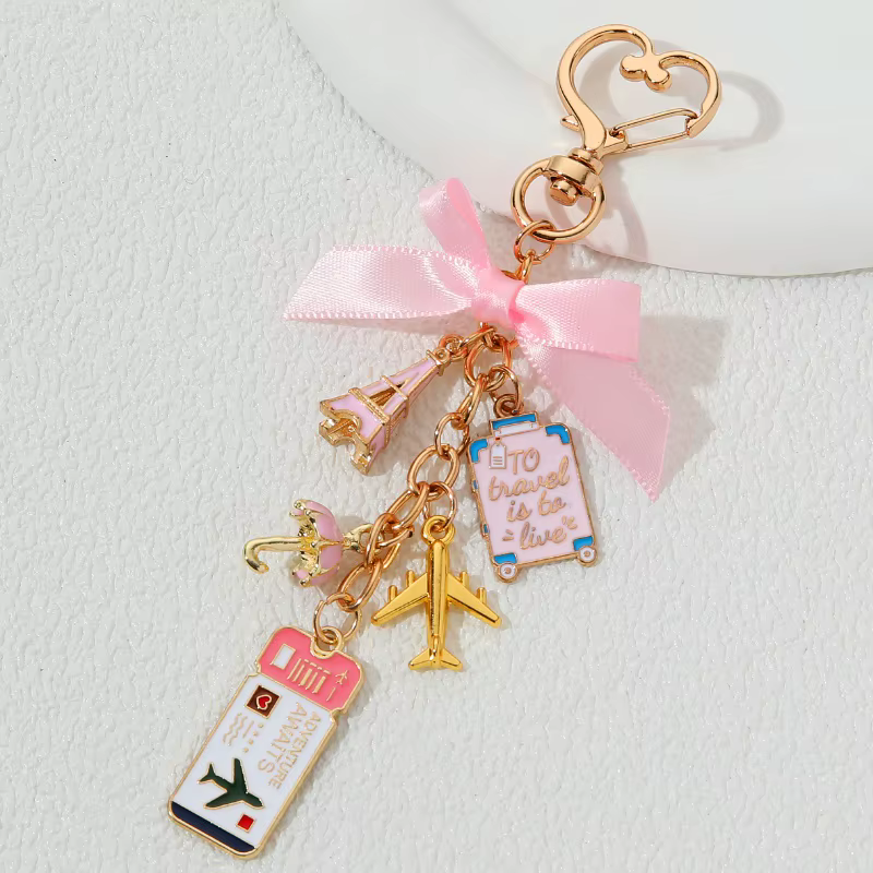 Porte-clés en émail, billet rose, avion, tour Eiffel à Paris, amour, romantique, pour femmes et fill